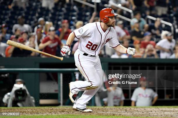 Daniel Murphy of the Washington Nationals drives in the game winning run with a single in the eighth inning against the Philadelphia Phillies at...