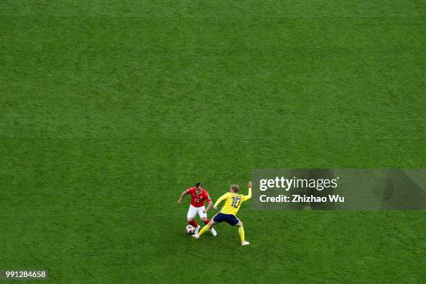 Xherdan Shaqiri of Switzerland and Emil Forsberg of Sweden compete each other during the 2018 FIFA World Cup Russia Round of 16 match between 1st...