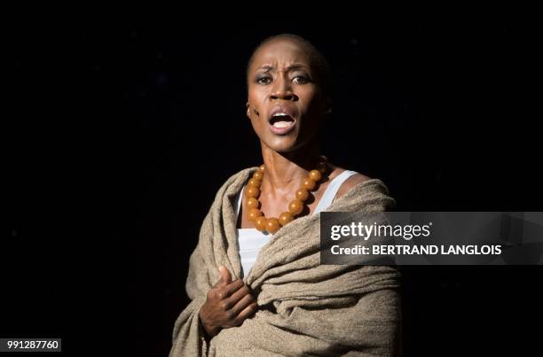 Malian singer Rokia Traore performs in Henry Purcell's opera "Dido and Aeneas " directed by Vincent Huguet and conducted by Vaclav Luks during the...