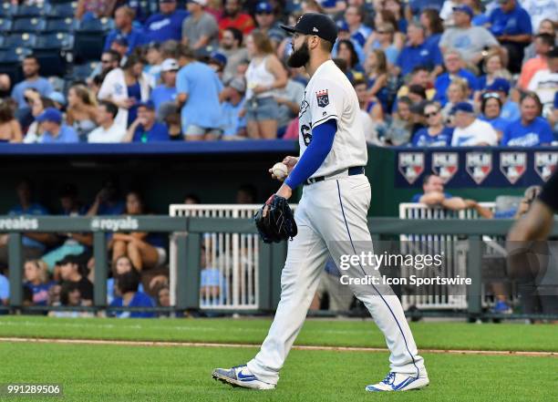 Kansas City Royals starting pitcher Jakob Junis reacts after giving up a grand slam home run to Cleveland Indians shortstop Francisco Lindor during a...