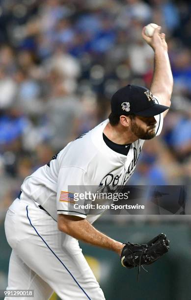Kansas City Royals relief pitcher Brian Flynn pitches in the sixth inning during a Major League Baseball game between the Cleveland Indians and the...