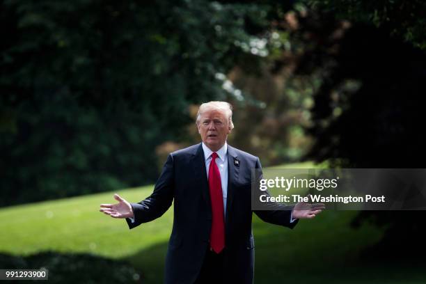 President Donald J. Trump walks from the Oval Office across the South Lawn to board Marine One at the White House on Tuesday, May 29, 2018 in...