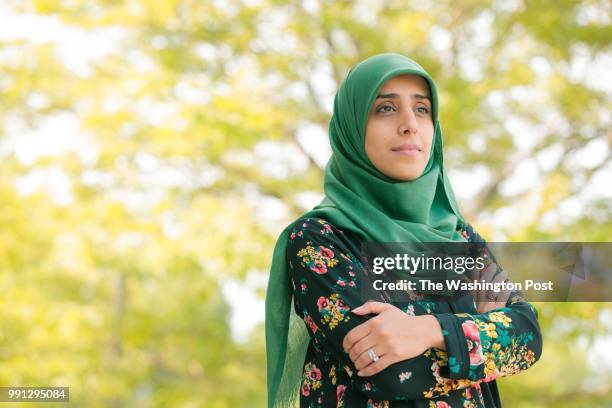 Naghem Swade, Program Coordinator at the Denver Public Library is arranged for a photograph at the Rodolfo "Corky" Gonzales Branch Library in Denver,...