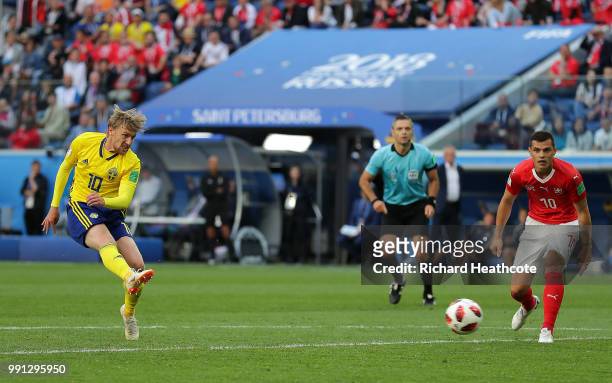 Emil Forsberg of Sweden scores his team's first goal during the 2018 FIFA World Cup Russia Round of 16 match between Sweden and Switzerland at Saint...