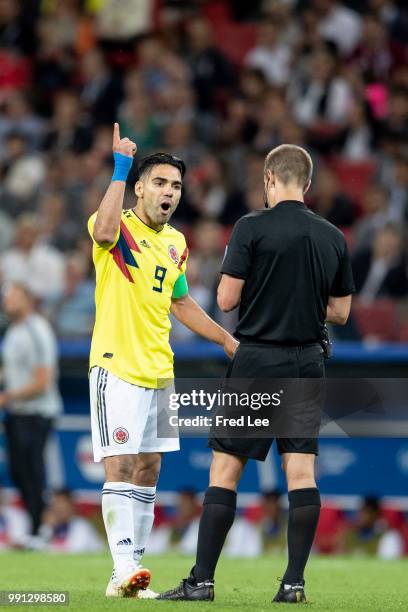 Radamel Falcao of Colombia speaks to the Referee during the 2018 FIFA World Cup Russia Round of 16 match between Colombia and England at Spartak...