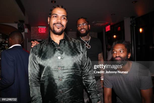Bully Brown, Dave East, and Cordell Lochin attend Bully Brown's Birthday Celebration at Esther & Carol on July 3, 2018 in New York City.