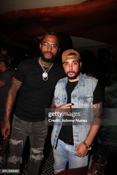 Dave East and Baby Mike attend Bully Brown's Birthday Celebration at Esther & Carol on July 3, 2018 in New York City.