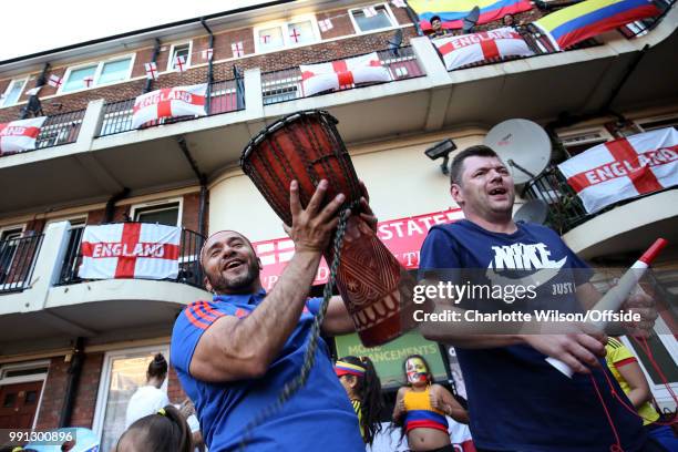 Colombian and English residents of the Kirby Estate dance together during half-time of the FIFA 2018 World Cup Finals match between Colombia and...