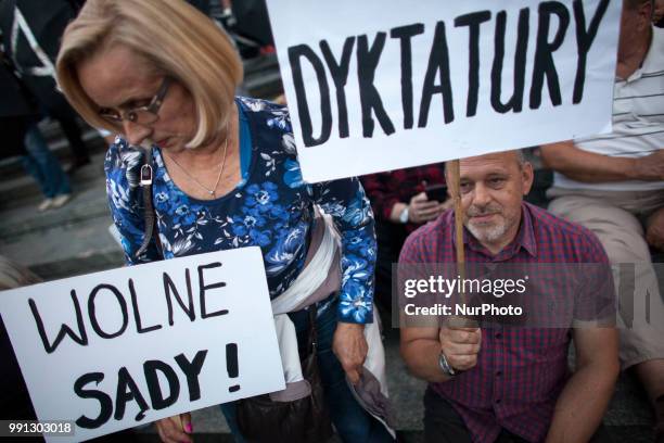 Protest near Supreme Court in Warsaw on July 3, 2018. A recently passed law which critics say is meant to remove political opposition forced nearly...