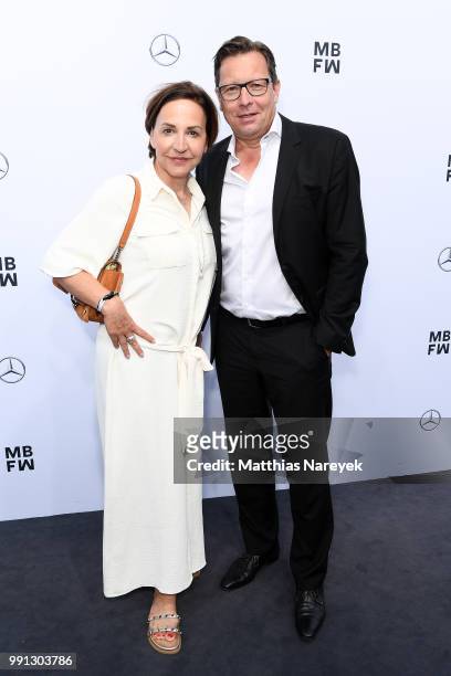 Petra Pfaller and Robert Poelzer attend the Sportalm Kitzbuehel show during the Berlin Fashion Week Spring/Summer 2019 at ewerk on July 4, 2018 in...