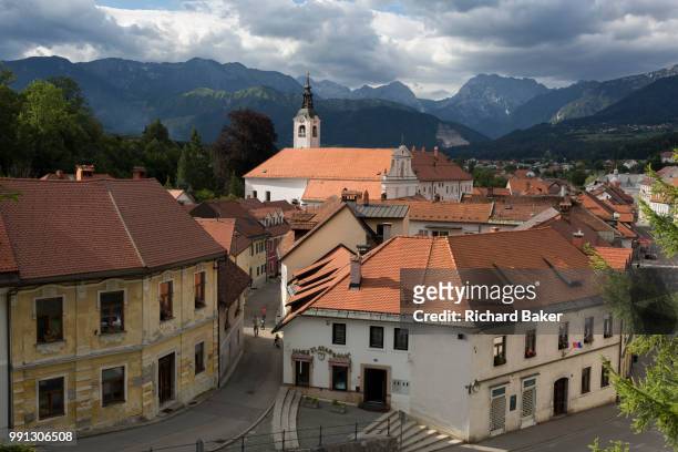 Looking north, an aerial view of the rural town of Kamnik in central Slovenia, on 26th June 2018, in Kamnik, Slovenia. As one of the oldest towns in...