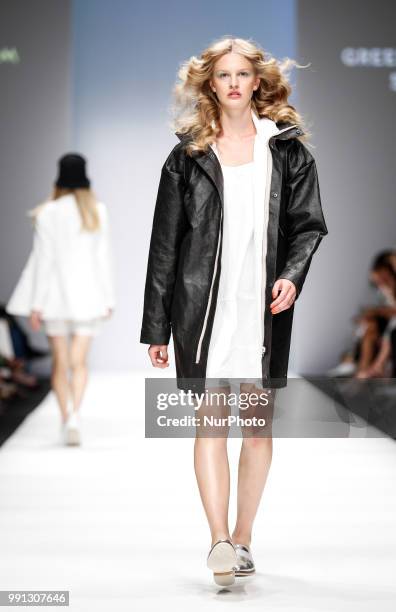 Model walks the runway at the Greenshowroom Selected show during the Berlin Fashion Week Spring/Summer 2019 at ewerk on July 3, 2018 in Berlin,...
