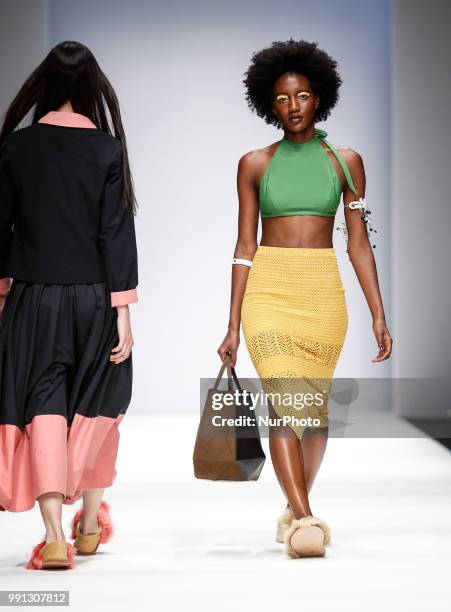 Model walks the runway at the Greenshowroom Selected show during the Berlin Fashion Week Spring/Summer 2019 at ewerk on July 3, 2018 in Berlin,...