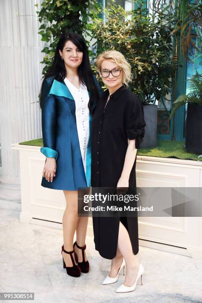 Gyunel and Evelina Khromtchenko attend the The Gyunel Couture Autumn/Winter 2018-19 Presentation as part of Paris Fashion Week on July 2, 2018 in...