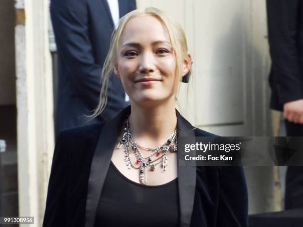 Pom Klementieff attends the Chanel Haute Couture Fall Winter 2018/19 show at Le Grand Palais on July 3, 2018 in Paris, France.