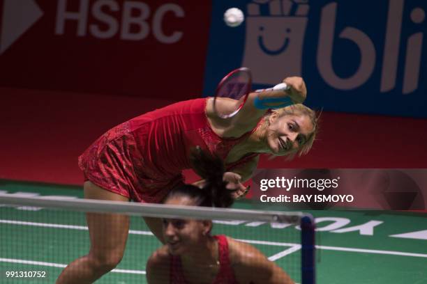 Stefani Stovea and Gabriella Stovea of Bulgaria hit a return against So Hee Lee and Seung Chan Shin of South Korea during their women's doubles...