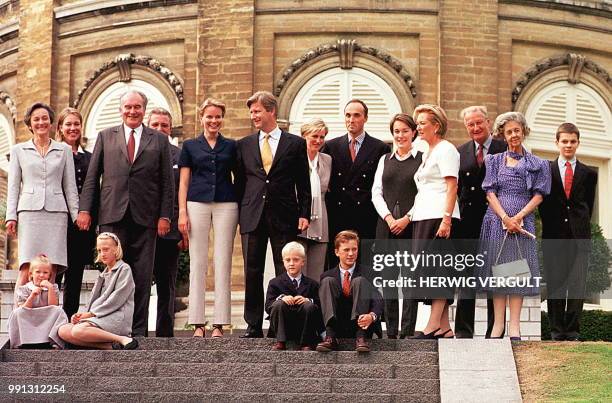 Belgian Crown Prince Philippe is flanked by his fiancee Mathilde d'Udekem d'Acoz and members of both families as they appear in public for the first...