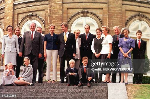 Belgian Crown Prince Philippe is flanked by his fiancee Mathilde d'Udekem d'Acoz and members of both families as they appear in public for the first...