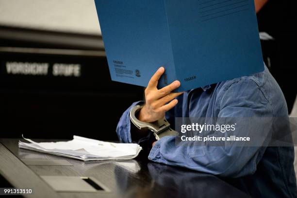 The 24-year-old defendant sits in the court room at the upper district court in Stuttgart, Germany, 9 November 2017. The 24-year-old is suspected of...