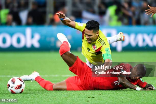 Ashley Young of England and Radamel Falcao of Colombia during the 2018 FIFA World Cup Russia Round of 16 match between Colombia and England at...