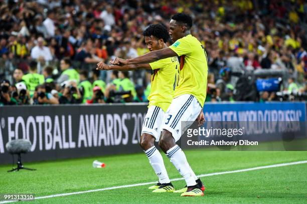 Yerry Mina of Colombia celebrates his goal with Juan Cuadrado during the 2018 FIFA World Cup Russia Round of 16 match between Colombia and England at...