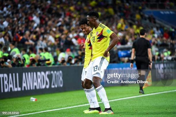 Yerry Mina of Colombia celebrates his goal with Juan Cuadrado during the 2018 FIFA World Cup Russia Round of 16 match between Colombia and England at...