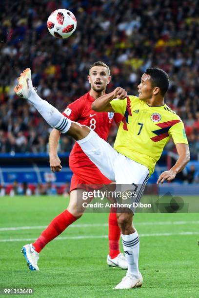 Carlos Bacca of Colombia and Jordan Henderson of England during the 2018 FIFA World Cup Russia Round of 16 match between Colombia and England at...