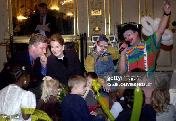 Princess Mathilde and Prince Philippe of Belgium attend the performance of a clown after the first prize-giving ceremony of the "Mathilde Fund",...