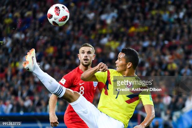 Carlos Bacca of Colombia and Jordan Henderson of England during the 2018 FIFA World Cup Russia Round of 16 match between Colombia and England at...
