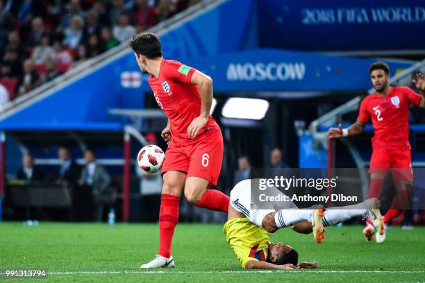 Harry Maguire of England and Carlos Bacca of Colombia during the 2018 FIFA World Cup Russia Round of 16 match between Colombia and England at Spartak...