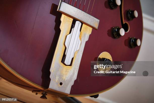 Detail of the engraved tailpiece on a vintage 1964 Gibson L5 CES electric guitar with a Cherry finish, taken on September 19, 2017.