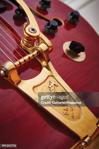 Detail of the gold-plated Bigsby tremolo on a vintage 1959 Gibson ES-350T electric guitar with a Cherry finish, taken on September 19, 2017.