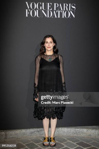 Actress Amira Casar attends the Vogue Foundation Dinner Photocall as part of Paris Fashion Week - Haute Couture Fall/Winter 2018-2019 at Musee...