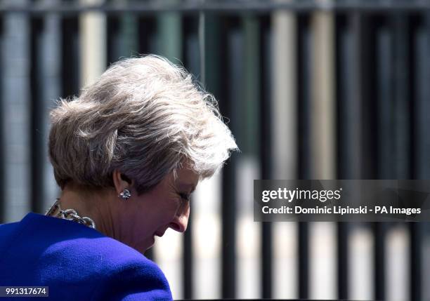 Prime Minister Theresa May leaves 10 Downing Street in Westminster, London, to attend Prime Minister's Questions at the House of Commons.