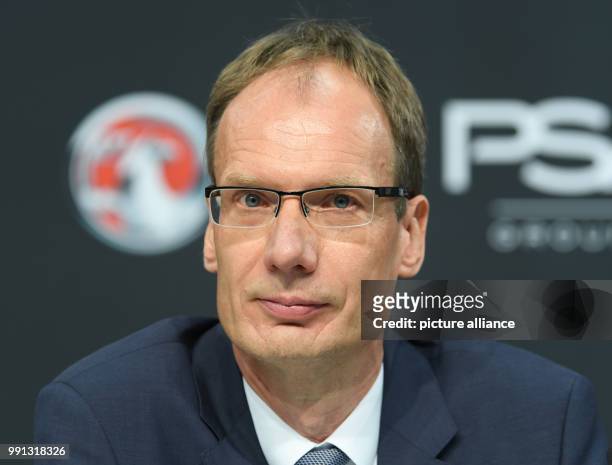 Michael Lohscheller, Opel Automobile's CEO, looks on the crowd during a press conference at the Opel Design Center in Ruesselsheim, Germany,...