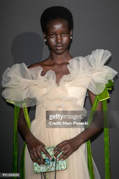 Model Adut Akech Bior attends the Vogue Foundation Dinner Photocall as part of Paris Fashion Week - Haute Couture Fall/Winter 2018-2019 at Musee...