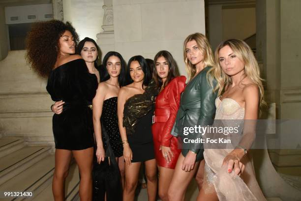 Tina Kunakey, Kistina Bazan, Erica Pelosini and guests attend the Alexandre Vauthier Haute Couture Fall Winter 2018/2019 show as part of Paris...