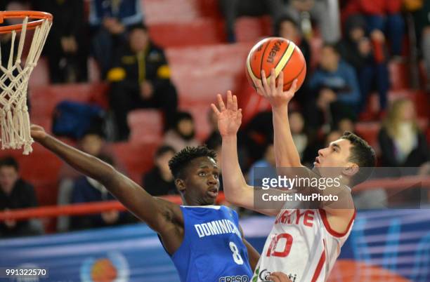 Atakan Erdek of Turkey in action against David Apolinar Jones Garcia of Dominican Republic during Fiba U17 Basketball World Cup 2018 match between...