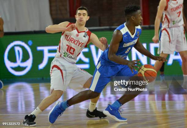 Atakan Erdek of Turkey in action against David Apolinar Jones Garcia of Dominican Republic during Fiba U17 Basketball World Cup 2018 match between...