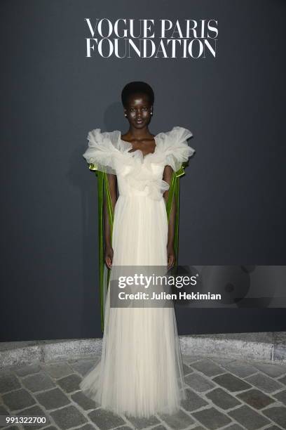 Adut Akech Bior attends Vogue Foundation Dinner Photocall as part of Paris Fashion Week - Haute Couture Fall/Winter 2018-2019 at Musee Galliera on...