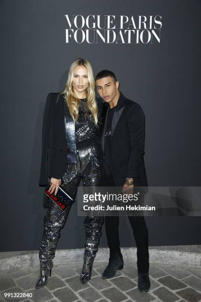 Olivier Rousteing and Natasha Poly attend Vogue Foundation Dinner Photocall as part of Paris Fashion Week - Haute Couture Fall/Winter 2018-2019 at...