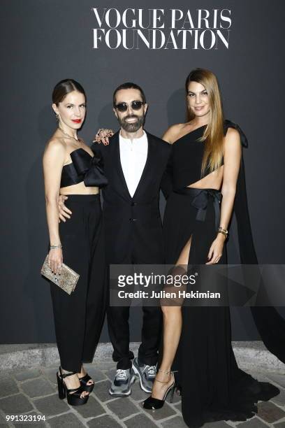 Eugenie Niarchos, Giambattista Valli and Bianca Brandolini attends Vogue Foundation Dinner Photocall as part of Paris Fashion Week - Haute Couture...