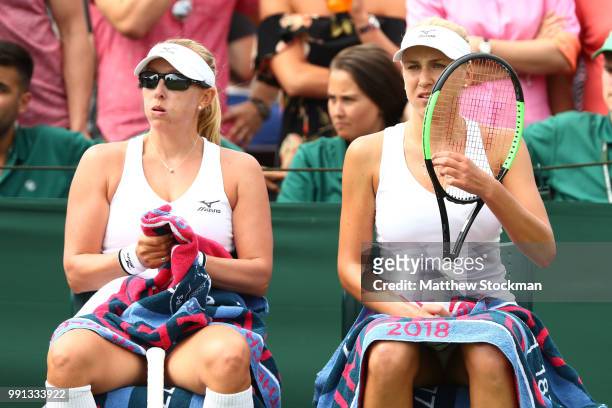 Nadiia Kichenok of Ukraine and Anastasia Rodionova of Australia during a break in their Ladies Doubles first round match against Anastasia...