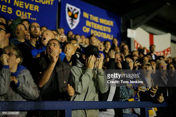 Home fans dispair at a miss in the 2nd half of the AFC Wimbledon v MK Dons League One match at Cherry Red Records Stadium on September 22nd 2017 in...