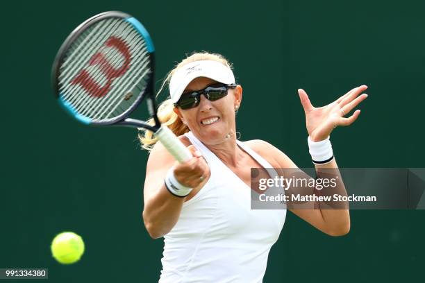 Anastasia Rodionova of Australia returns against Anastasia Pavlyuchenkova of Russia and Samantha Stosur of Australia during her Ladies' Doubles first...