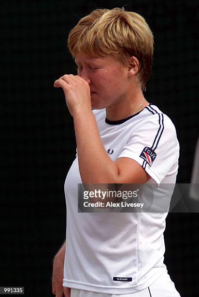 Dejected Elena Baltacha of Great Britain after losing against Angelique Widjaja of Indonesia during the girl's semi finals of The All England Lawn...