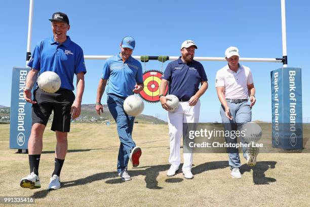 Players Kieran Donaghy of Kerry and Michael Murphy of Donegal pose for the camera with Golfer's Shane Lowry of Ireland and Paul Dunne of Ireland...