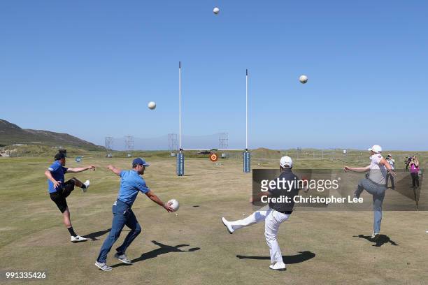 Players Kieran Donaghy of Kerry and Michael Murphy of Donegal with Golfer's Shane Lowry of Ireland and Paul Dunne of Ireland compete in the GAA...
