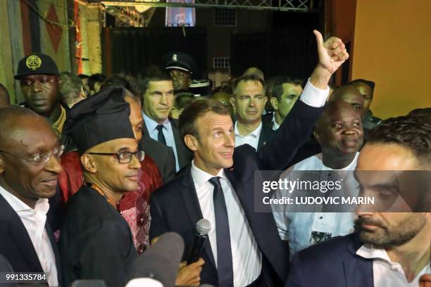 French President Emmanuel Macron arrives to take part of a live show in the Afrika Shrine in Lagos on July 3, 2018. - French President Emmanuel...