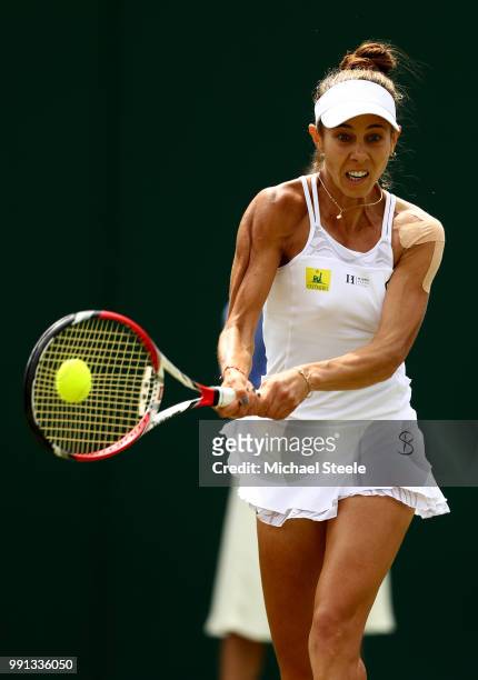 Mihaela Buzarnescu of Romania returns against Katie Swan of Great Britain during their Ladies' Singles second round match on day three of the...